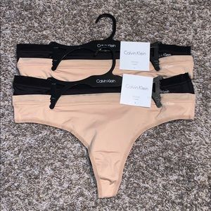 4 NWT Calvin Klein Thongs (large)